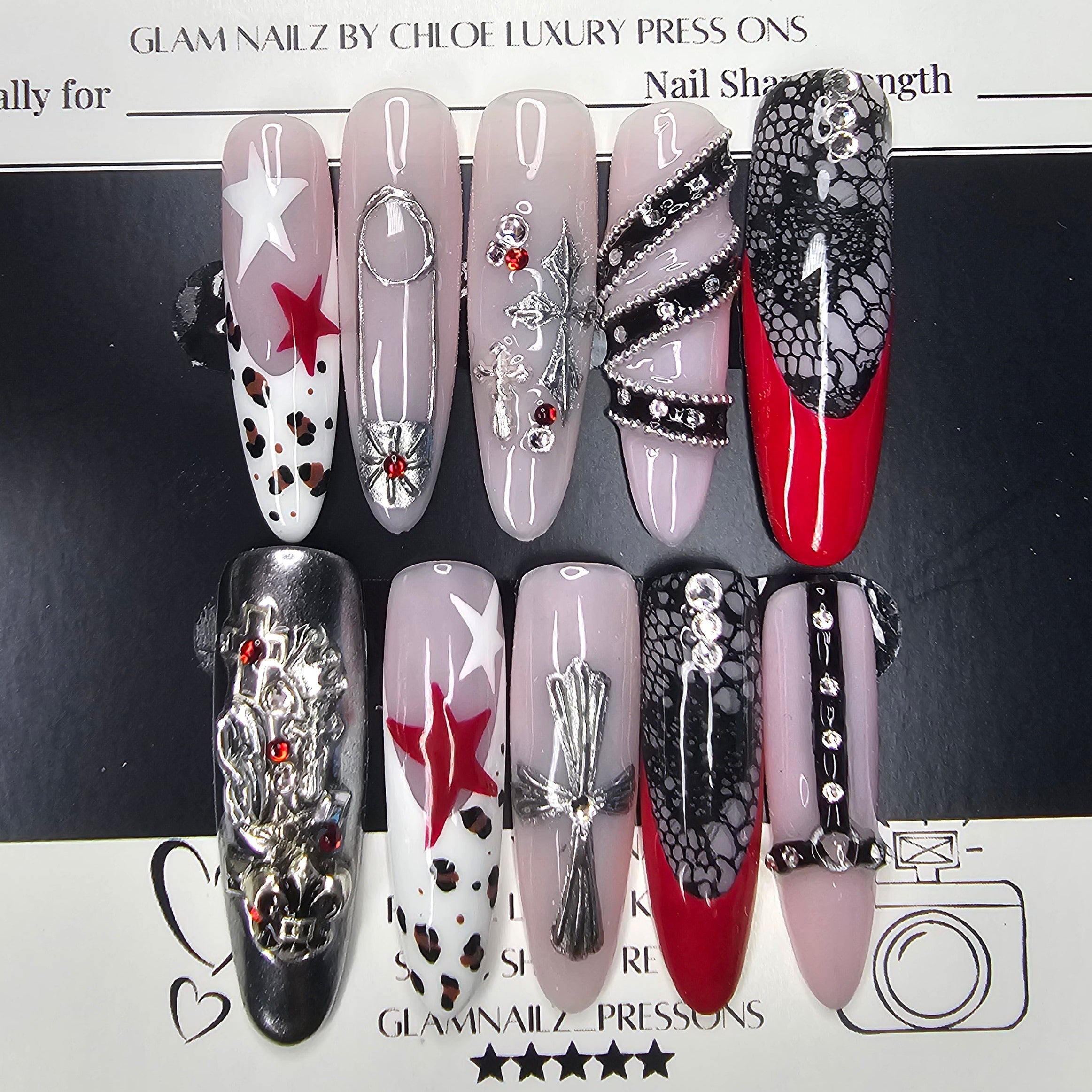 Collection of decorative false nails on a magazine page