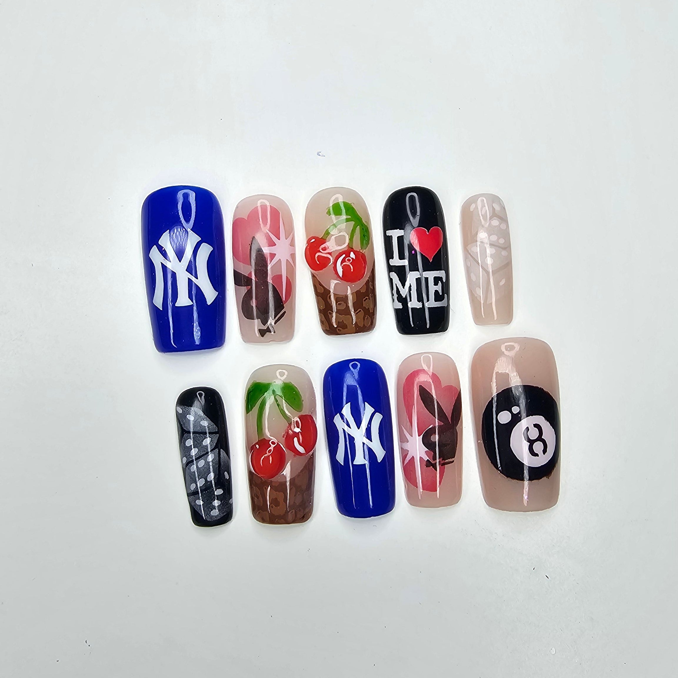Set of colorful nail art designs on a white background