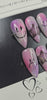 Medium Almond Airbrushed Press-On Nails | Smiley & Sad Face Design with Cat Eye Shimmer Base